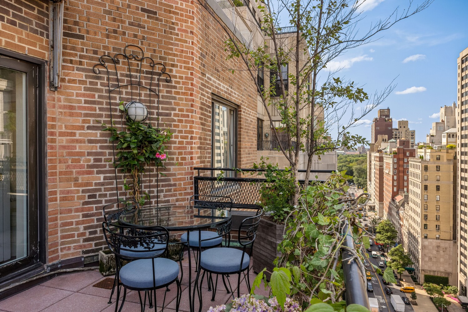 120 East 79th Street, Unit PH20 Manhattan, NY 10075 - Photo 3 of 20 a view of a chairs and table in the patio