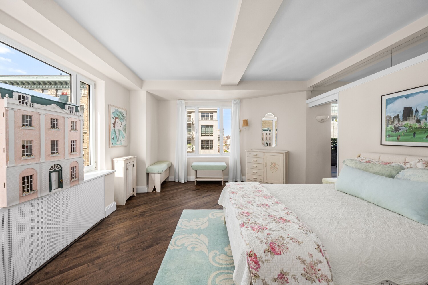 120 East 79th Street, Unit PH20 Manhattan, NY 10075 - Photo 6 of 20 a bedroom with a large bed couch and a window