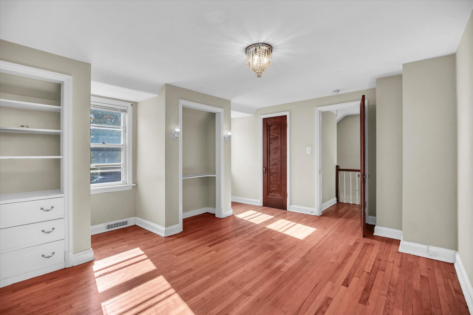 910 West Springfield Avenue Champaign, IL 61821 - Photo 24 of 45 a view of empty room with wooden floor