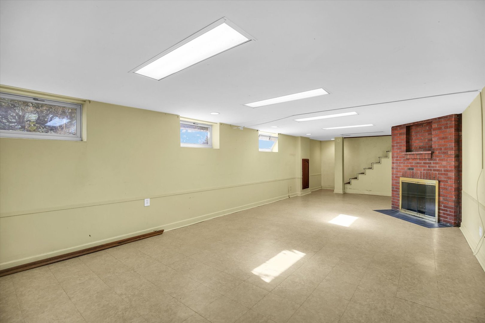 910 West Springfield Avenue Champaign, IL 61821 - Photo 33 of 45 a view of empty room with a fireplace
