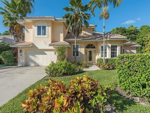 front view of a house with a garden