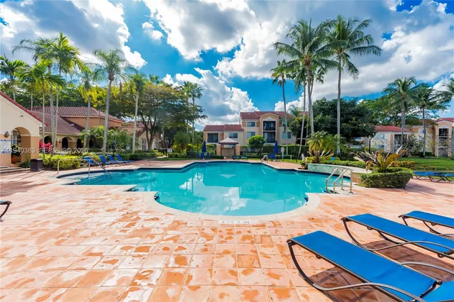 a view of an outdoor space pool patio and outdoor seating