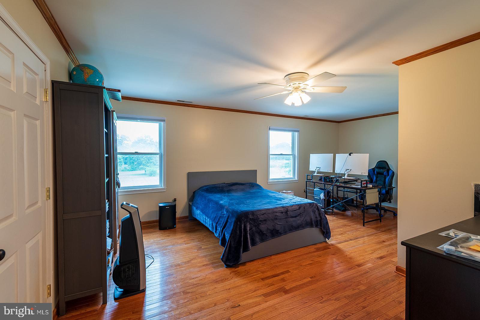 2613 Hoopers Island Road Fishing Creek, MD 21634 - Photo 28 of 54 a bedroom with furniture and a window