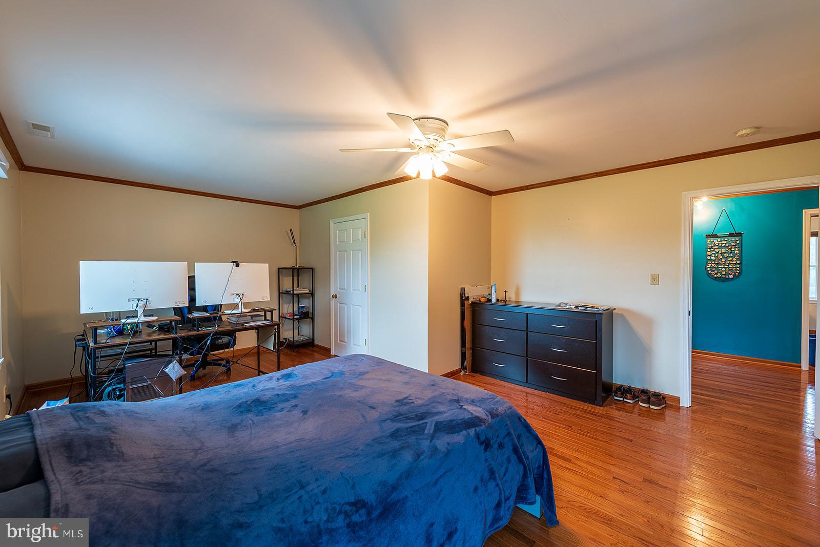 2613 Hoopers Island Road Fishing Creek, MD 21634 - Photo 29 of 54 a bed room with a bed and a television