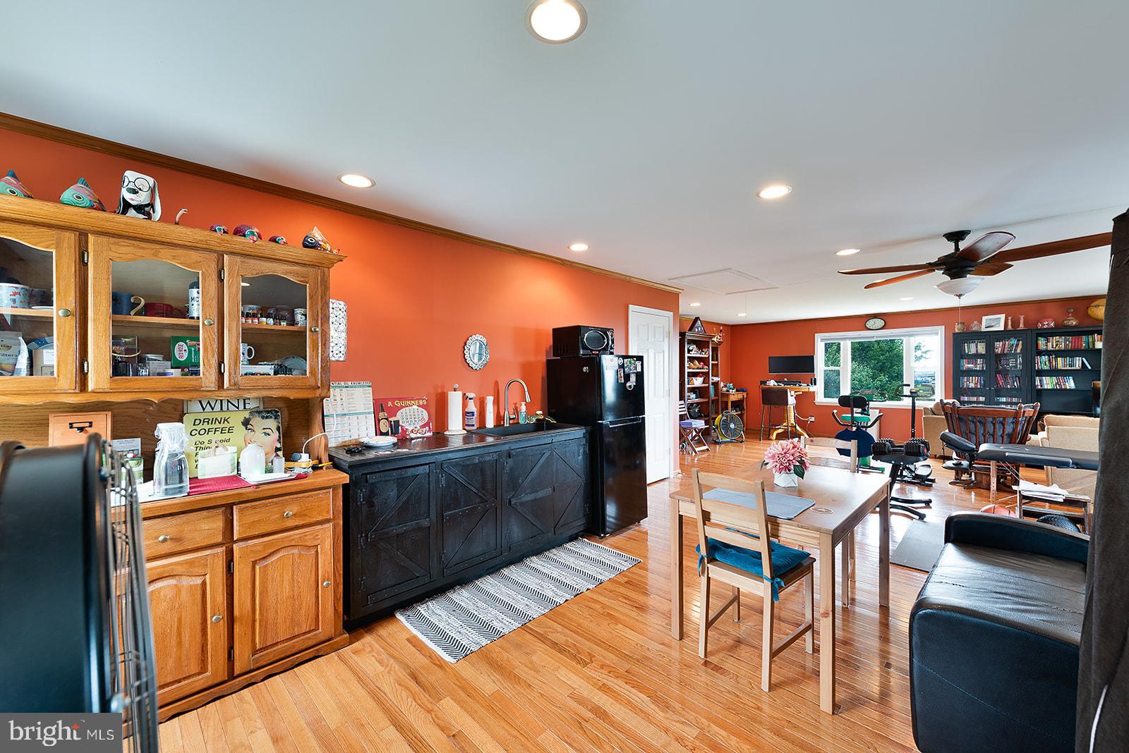 2613 Hoopers Island Road Fishing Creek, MD 21634 - Photo 33 of 54 a large kitchen with a table and chairs