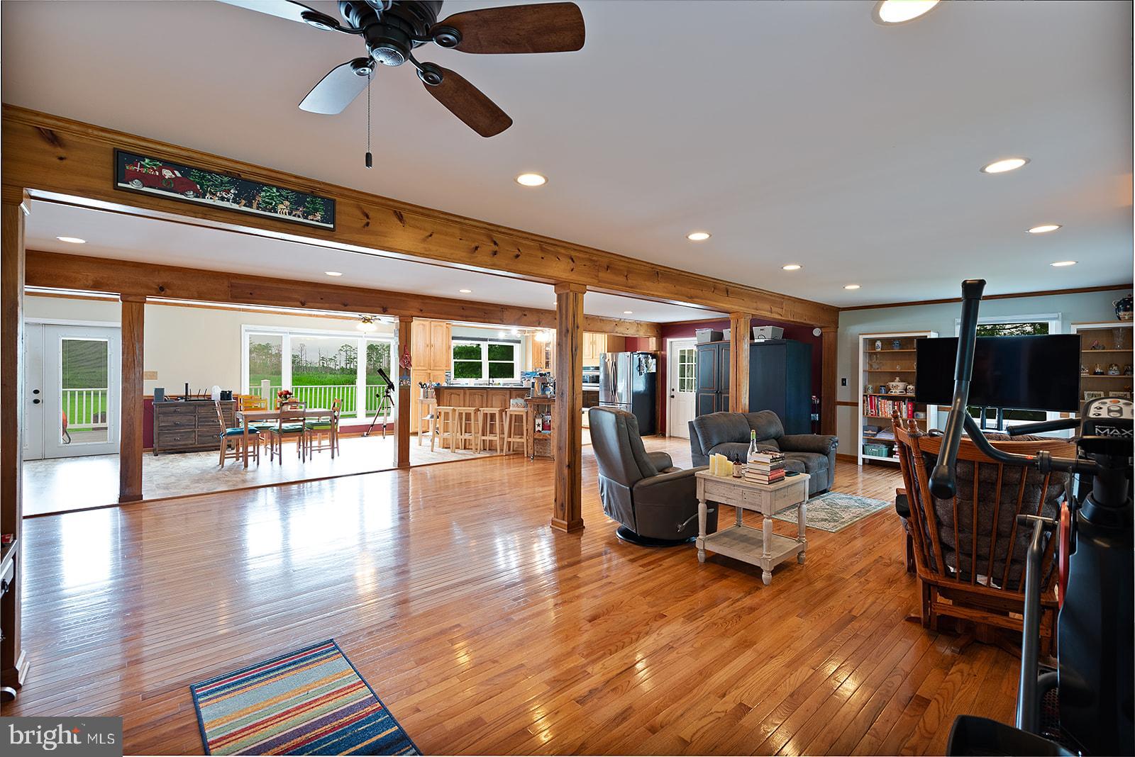 2613 Hoopers Island Road Fishing Creek, MD 21634 - Photo 8 of 54 a living room with furniture and a large window