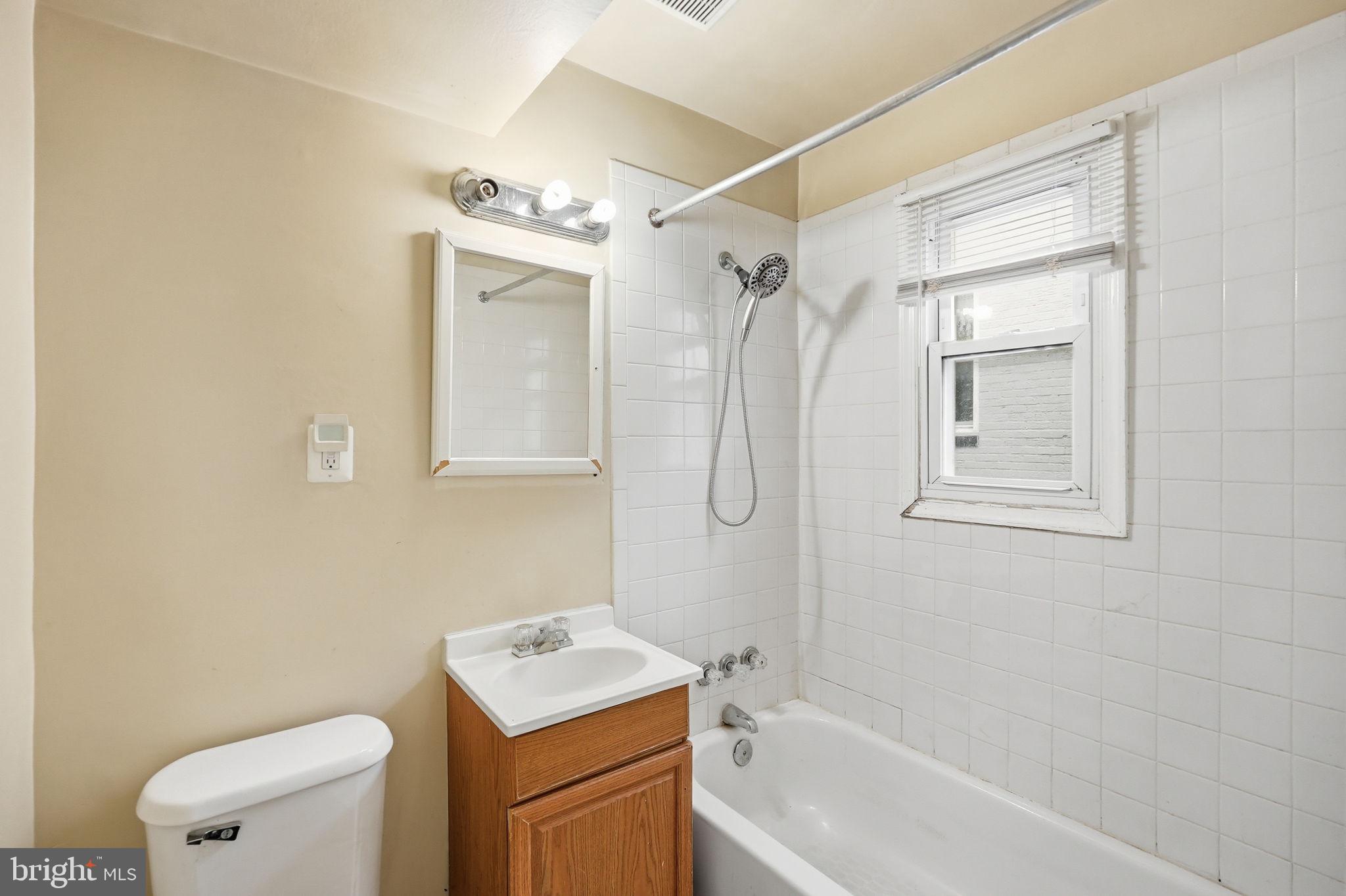 3417 B Street Southeast Washington, DC 20019 - Photo 17 of 22 a bathroom with a sink toilet and shower