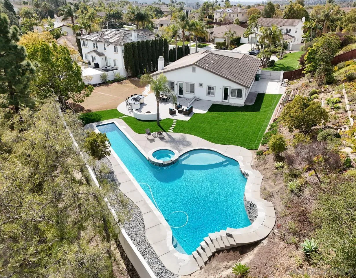 6814 Moorhen Place Carlsbad, CA 92011 - Photo 2 of 37 an aerial view of a house with outdoor space
