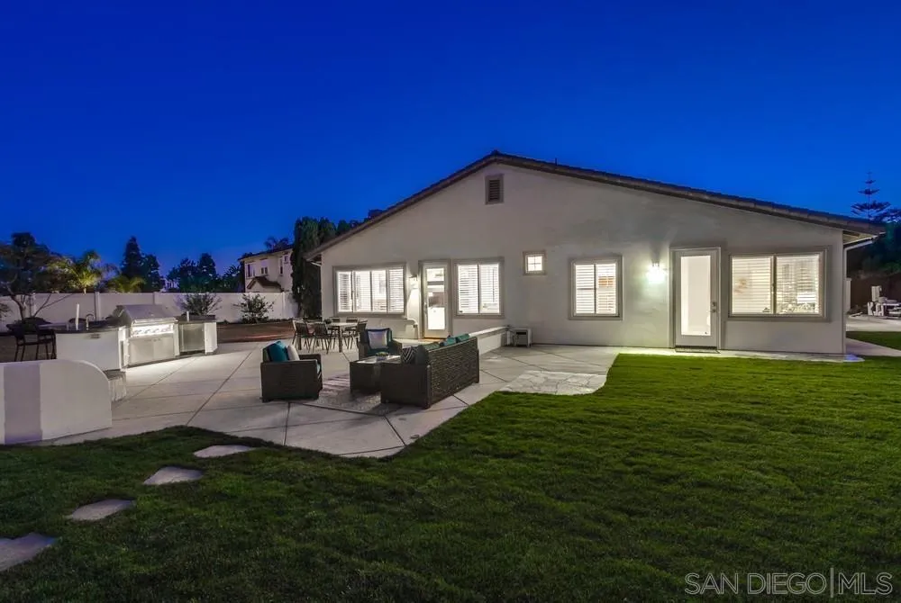 6814 Moorhen Place Carlsbad, CA 92011 - Photo 32 of 37 a view of a house with backyard and sitting area