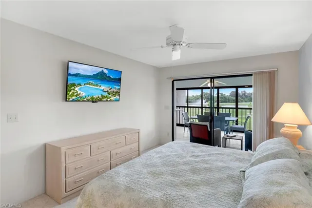 a bathroom with a shower sink and mirror