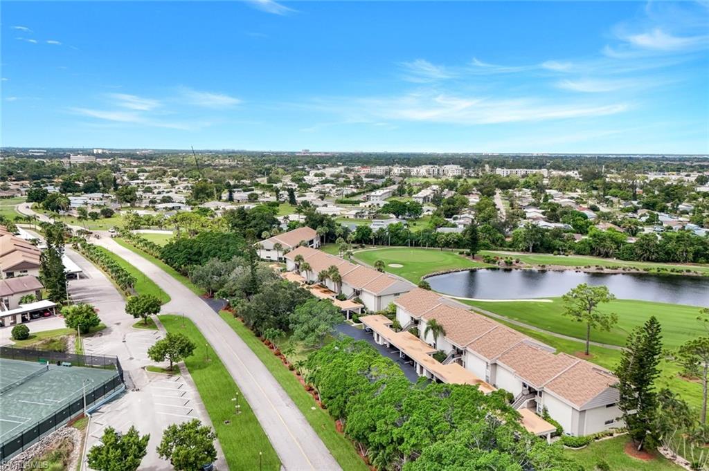 5585 Trailwinds Drive, Unit 326 Fort Myers, FL 33907 - Photo 25 of 37 an aerial view of a city with lake view