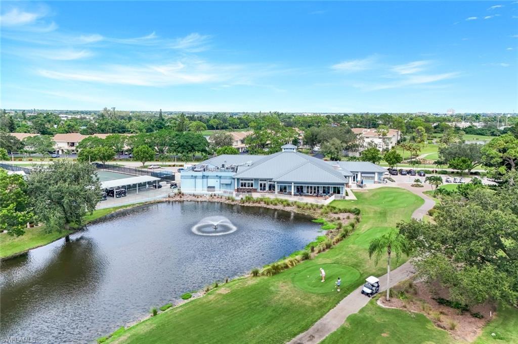 5585 Trailwinds Drive, Unit 326 Fort Myers, FL 33907 - Photo 35 of 37 an aerial view of residential house with outdoor space and swimming pool