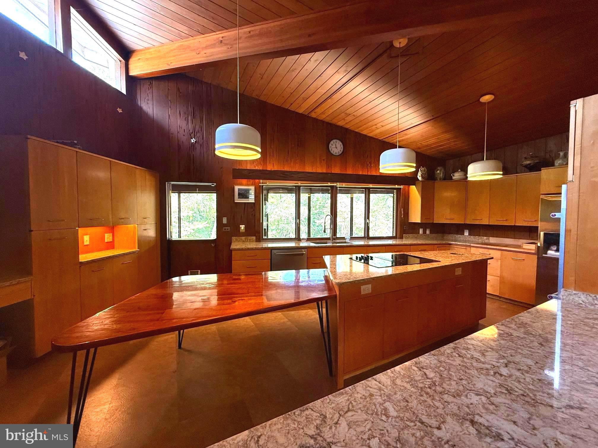 108 South Spring Valley Road Wilmington, DE 19807 - Photo 34 of 84 a kitchen with stainless steel appliances granite countertop a stove a sink and a refrigerator