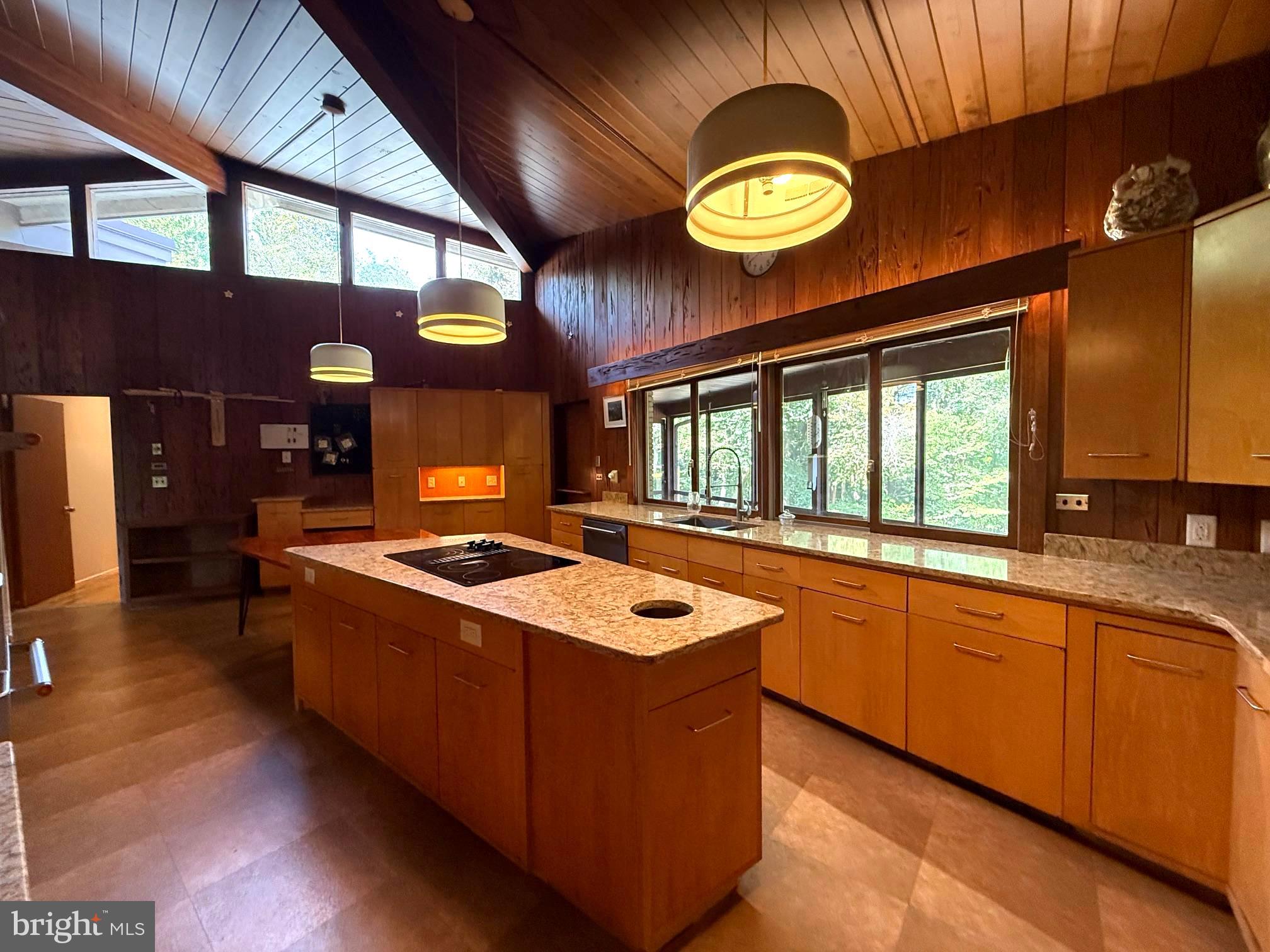 108 South Spring Valley Road Wilmington, DE 19807 - Photo 40 of 84 a kitchen with stainless steel appliances granite countertop a stove a sink and a refrigerator