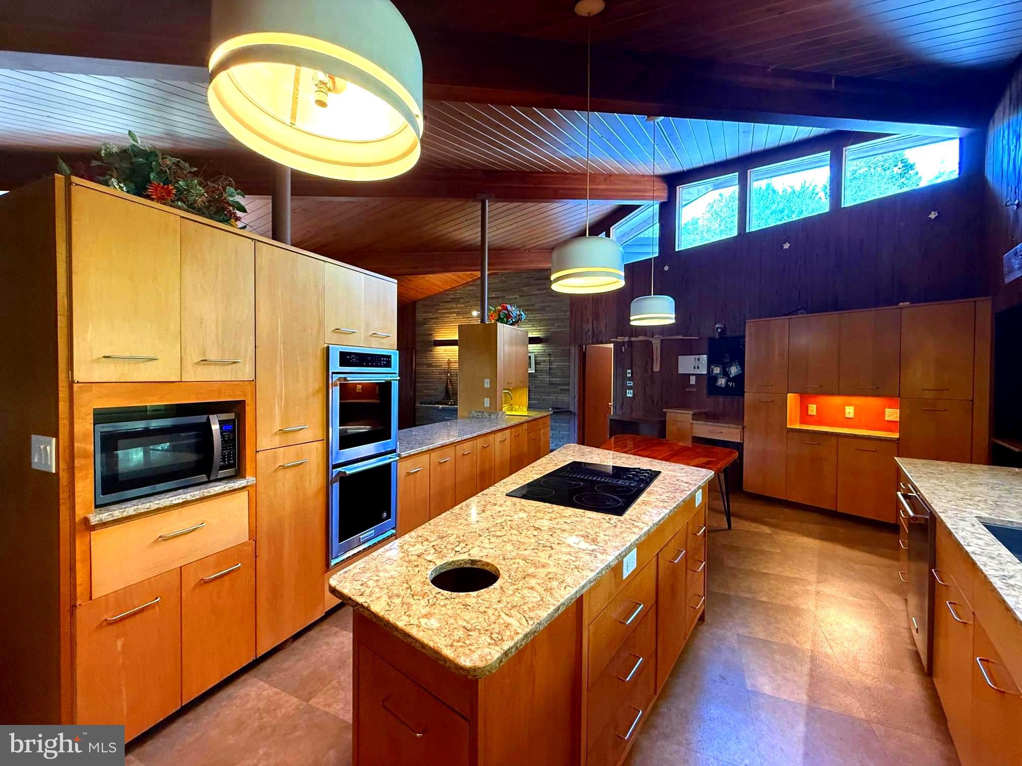 108 South Spring Valley Road Wilmington, DE 19807 - Photo 41 of 84 a kitchen with a stove and a microwave oven