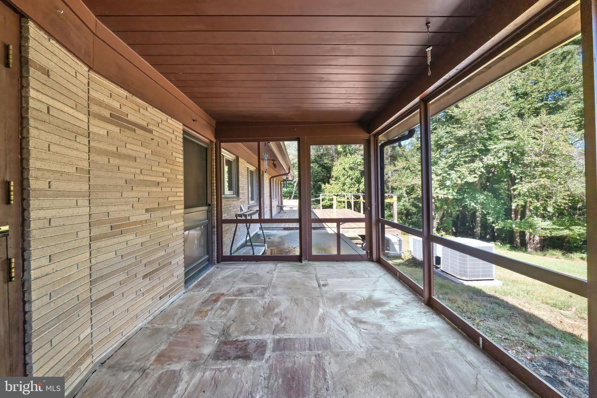 108 South Spring Valley Road Wilmington, DE 19807 - Photo 60 of 84 a view of a porch with wooden floor