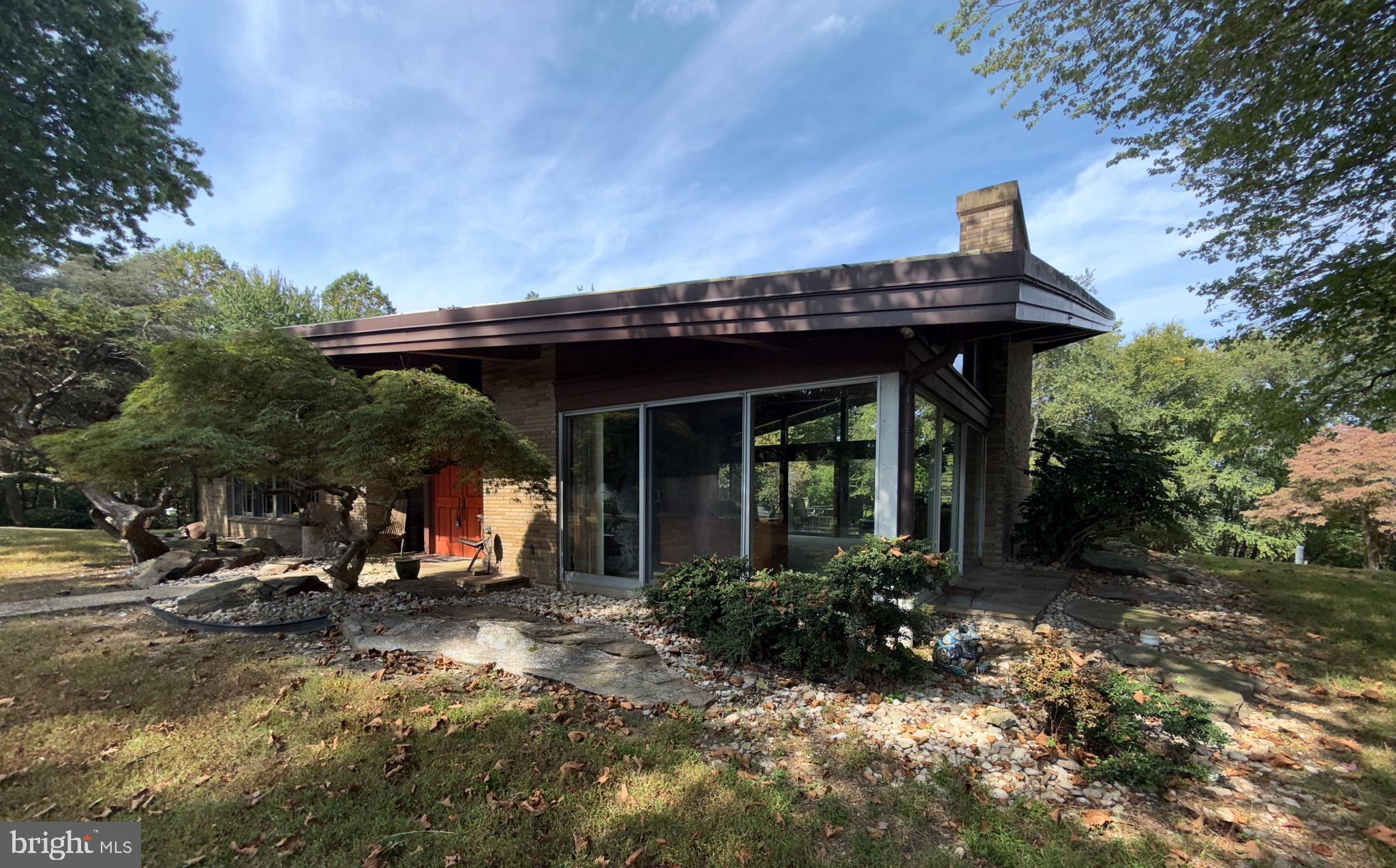 108 South Spring Valley Road Wilmington, DE 19807 - Photo 72 of 84 a view of a house with backyard porch and sitting area