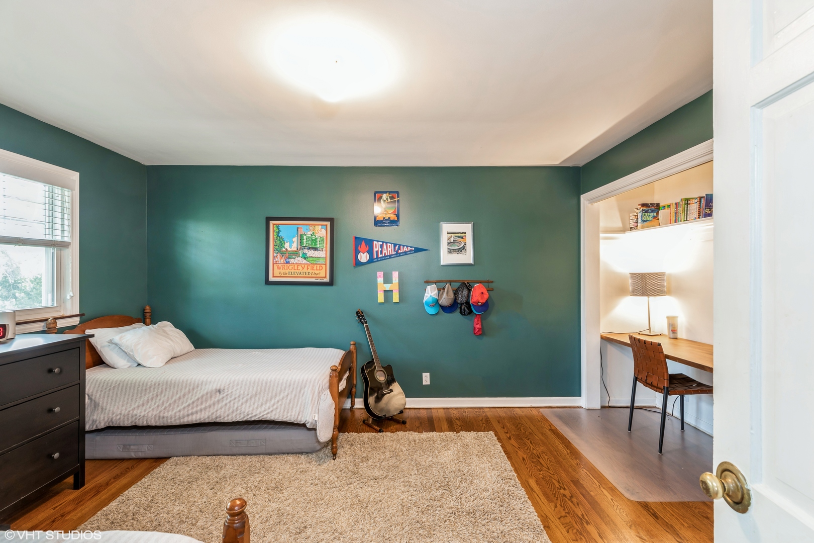 2160 Chestnut Road Homewood, IL 60430 - Photo 11 of 24 a bedroom with a bed and a table in it