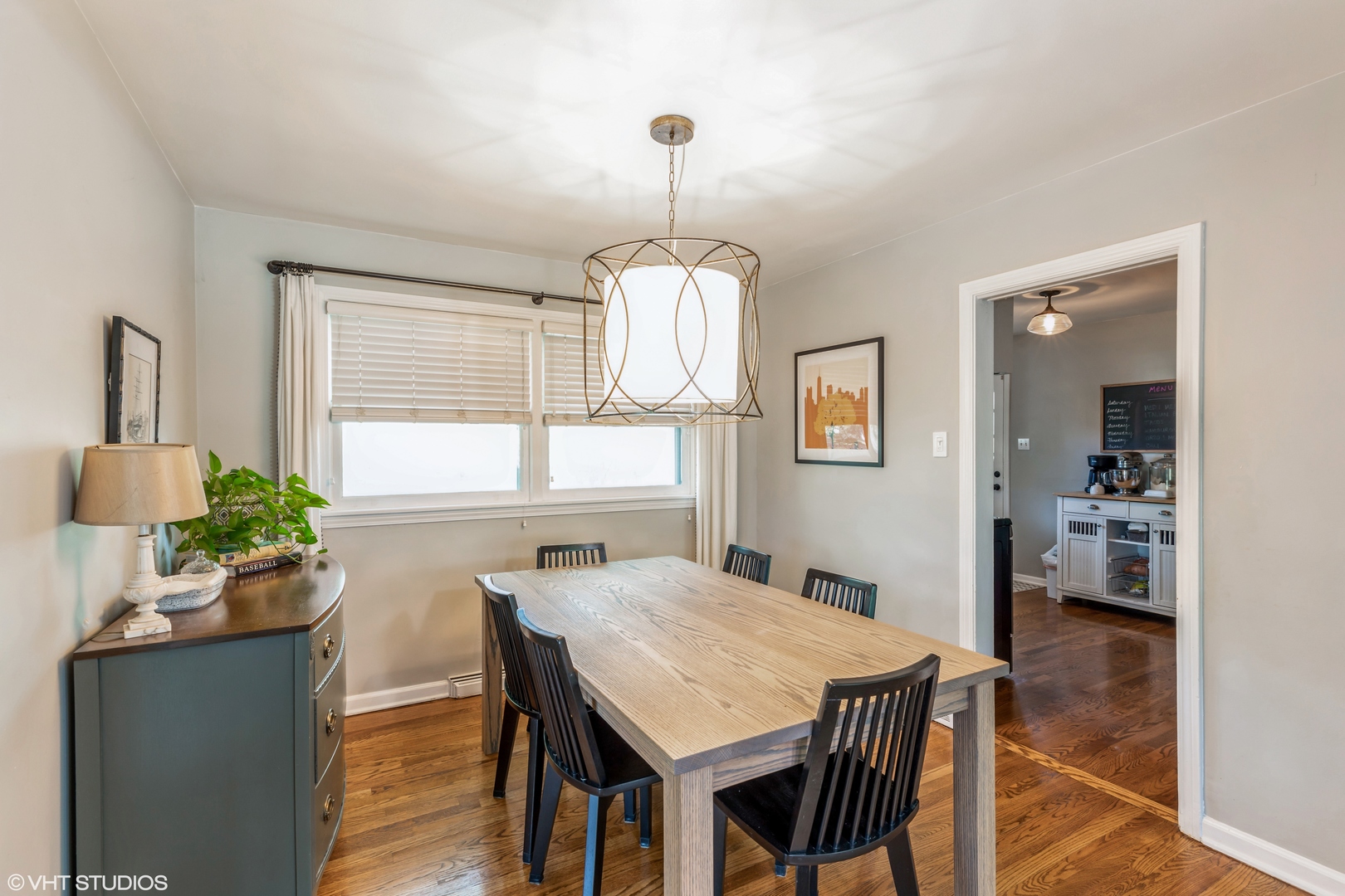 2160 Chestnut Road Homewood, IL 60430 - Photo 7 of 24 a view of a dining room with furniture window and wooden floor
