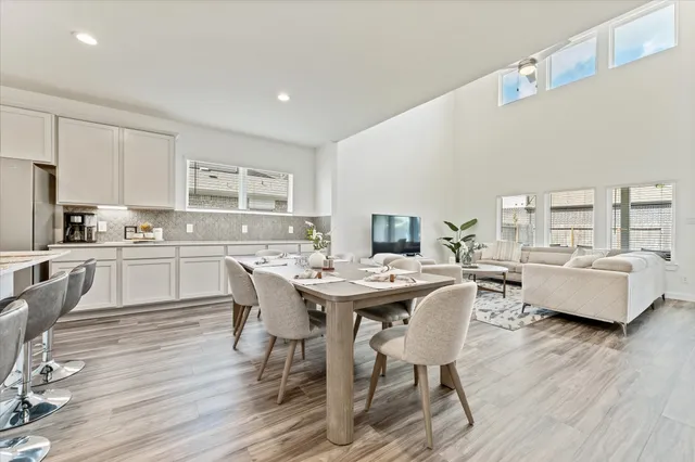 a bedroom with a bed and a chair