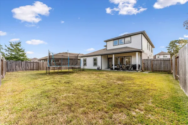 a front view of a house with swimming pool