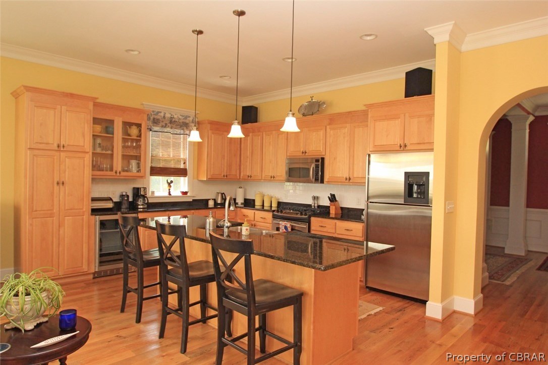 35 West High Bank Road White Stone, VA 22578 - Photo 15 of 37 Fabulous, large Kitchen with custom cabinets, granite countertops, built-in wine fridge, stainless steel appliances...great place to entertain!