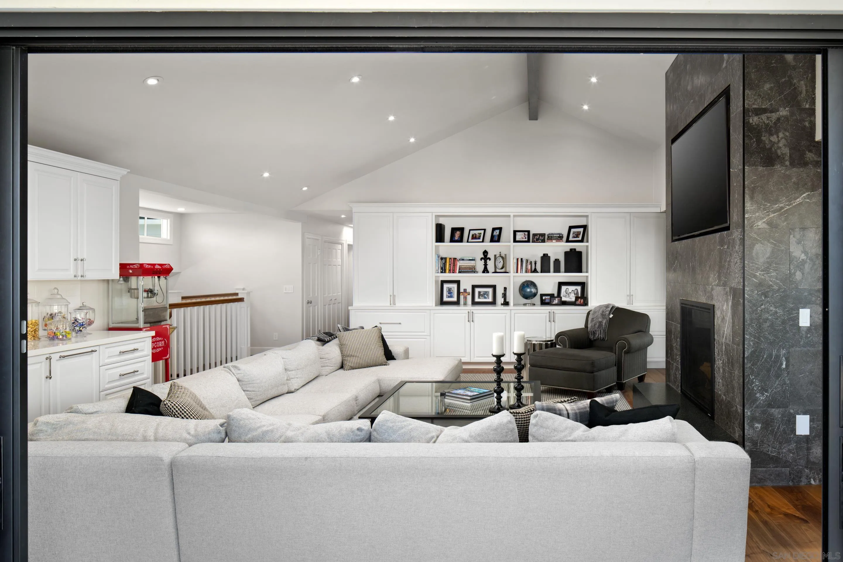3530 Silvergate Place San Diego, CA 92106 - Photo 16 of 41 a living room with furniture and a flat screen tv