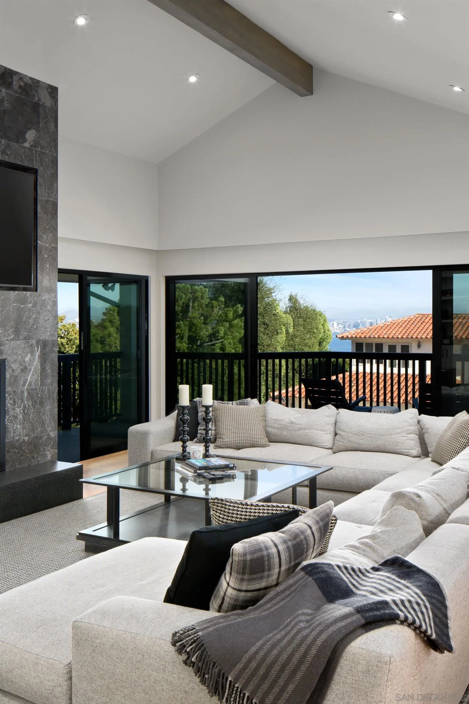 3530 Silvergate Place San Diego, CA 92106 - Photo 17 of 41 a living room with furniture and a large window
