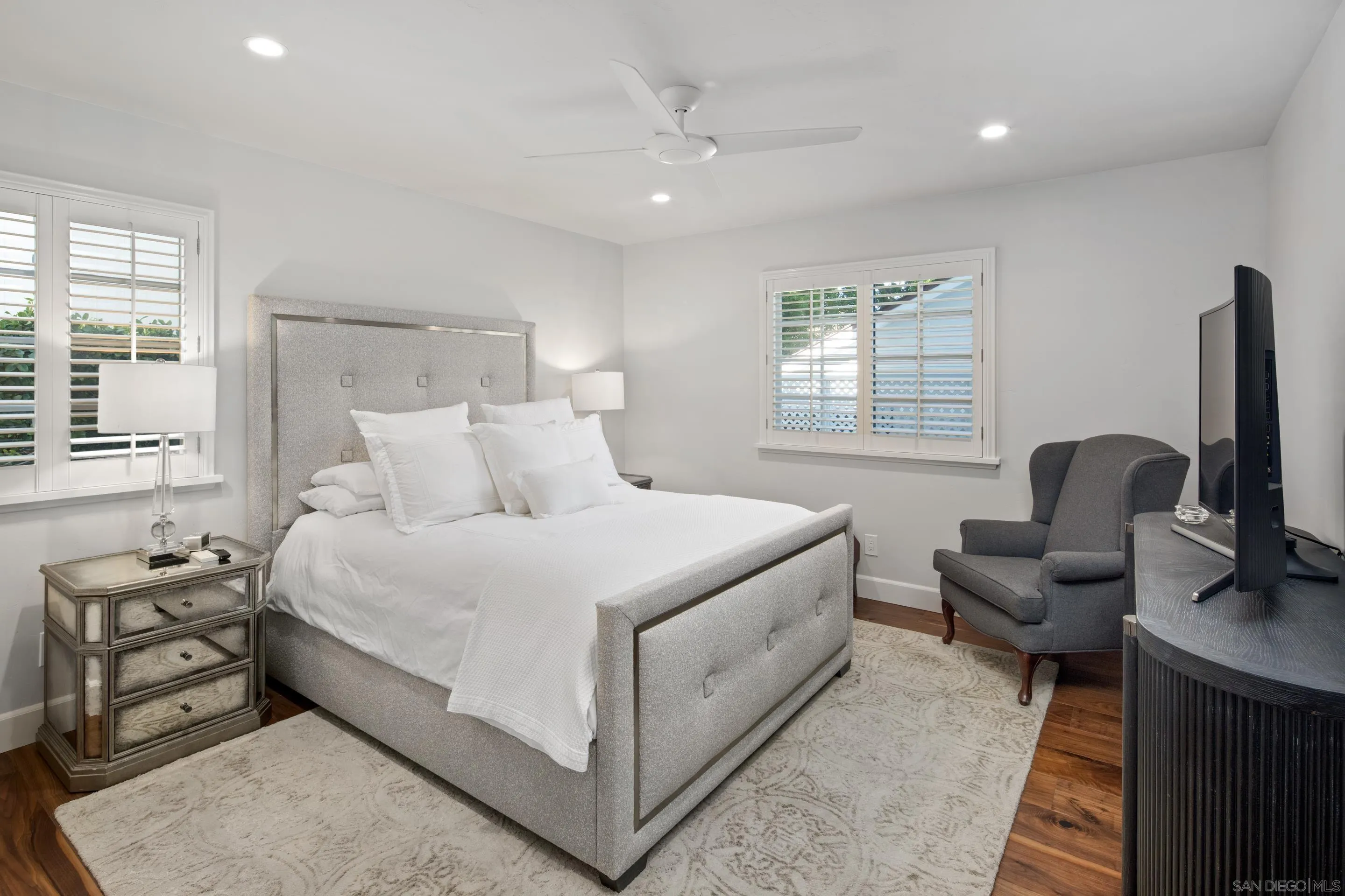 3530 Silvergate Place San Diego, CA 92106 - Photo 26 of 41 a bedroom with a bed a couch and dresser