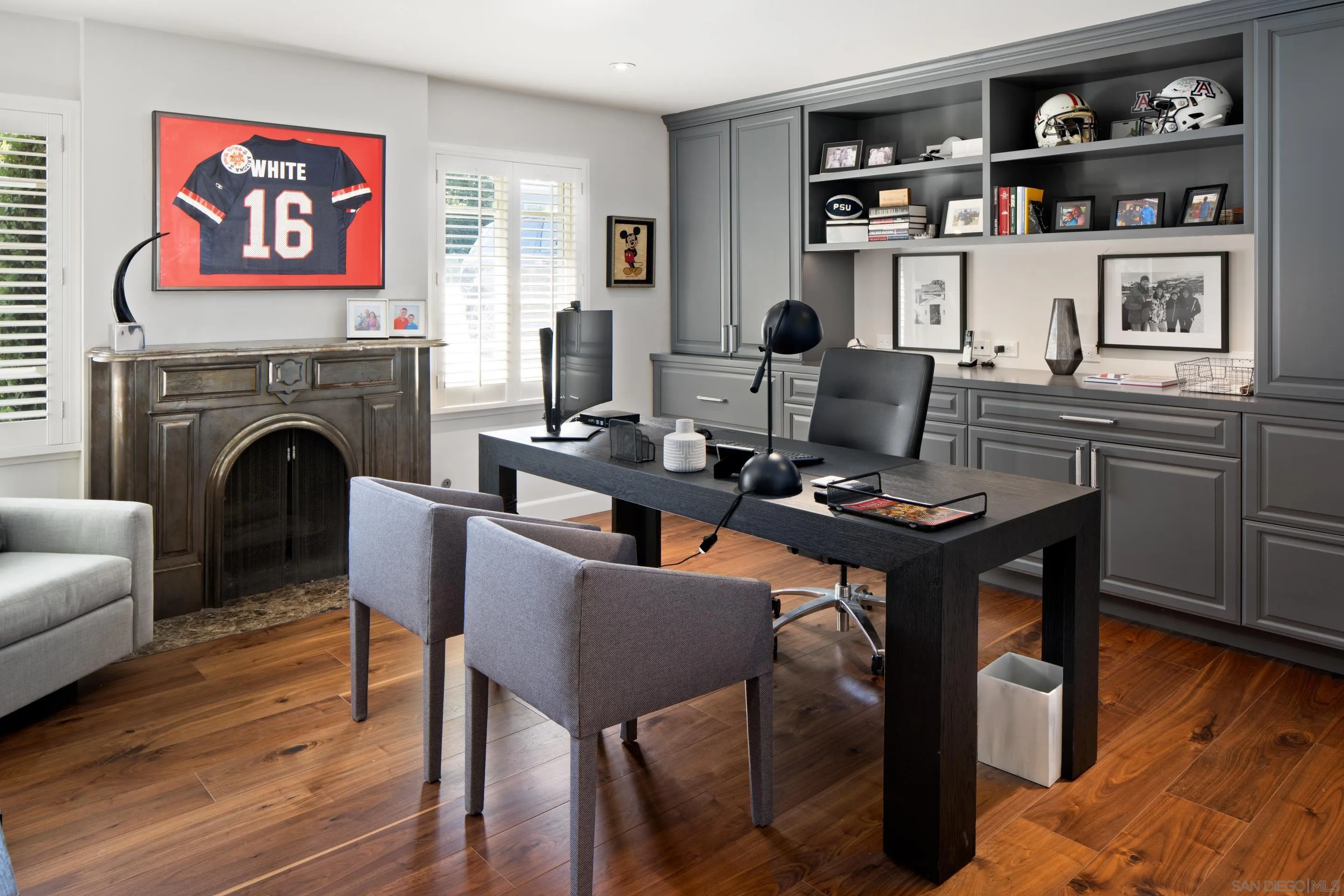 3530 Silvergate Place San Diego, CA 92106 - Photo 28 of 41 a living room with furniture a rug and a fireplace