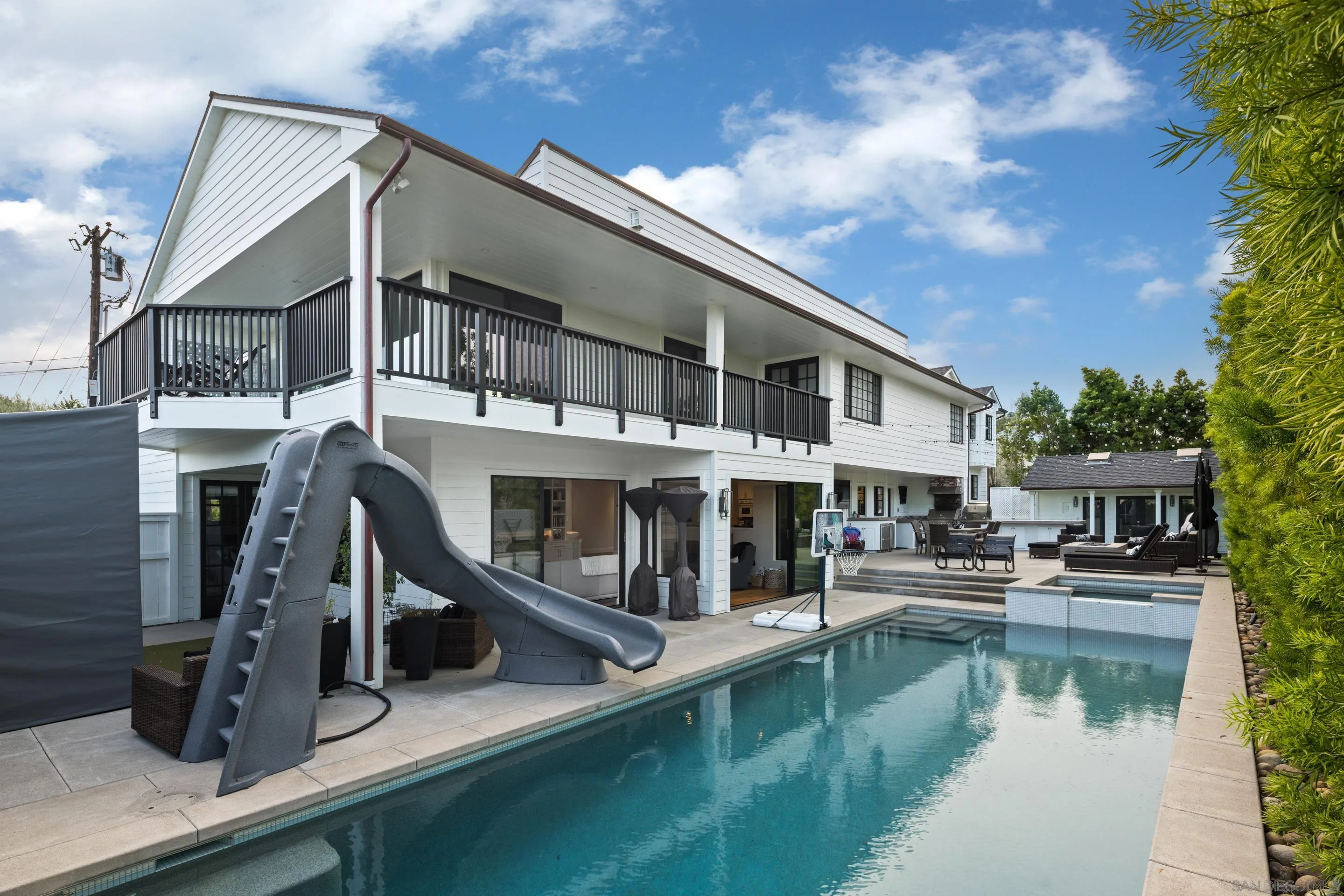 3530 Silvergate Place San Diego, CA 92106 - Photo 31 of 41 a view of a house with pool and chairs