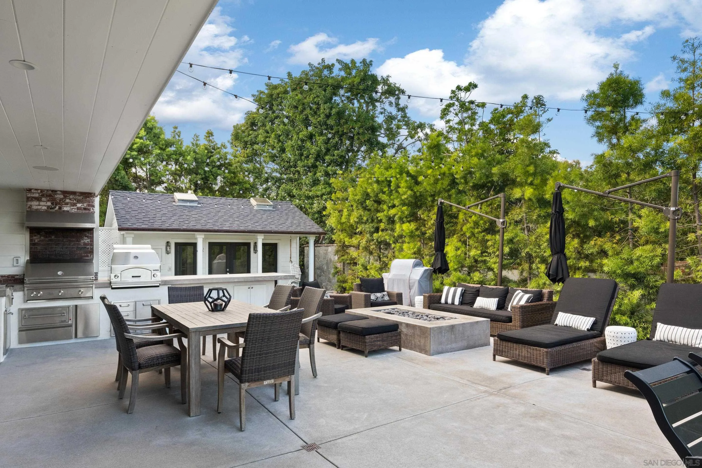 3530 Silvergate Place San Diego, CA 92106 - Photo 32 of 41 a view of a patio with table and chairs and potted plants