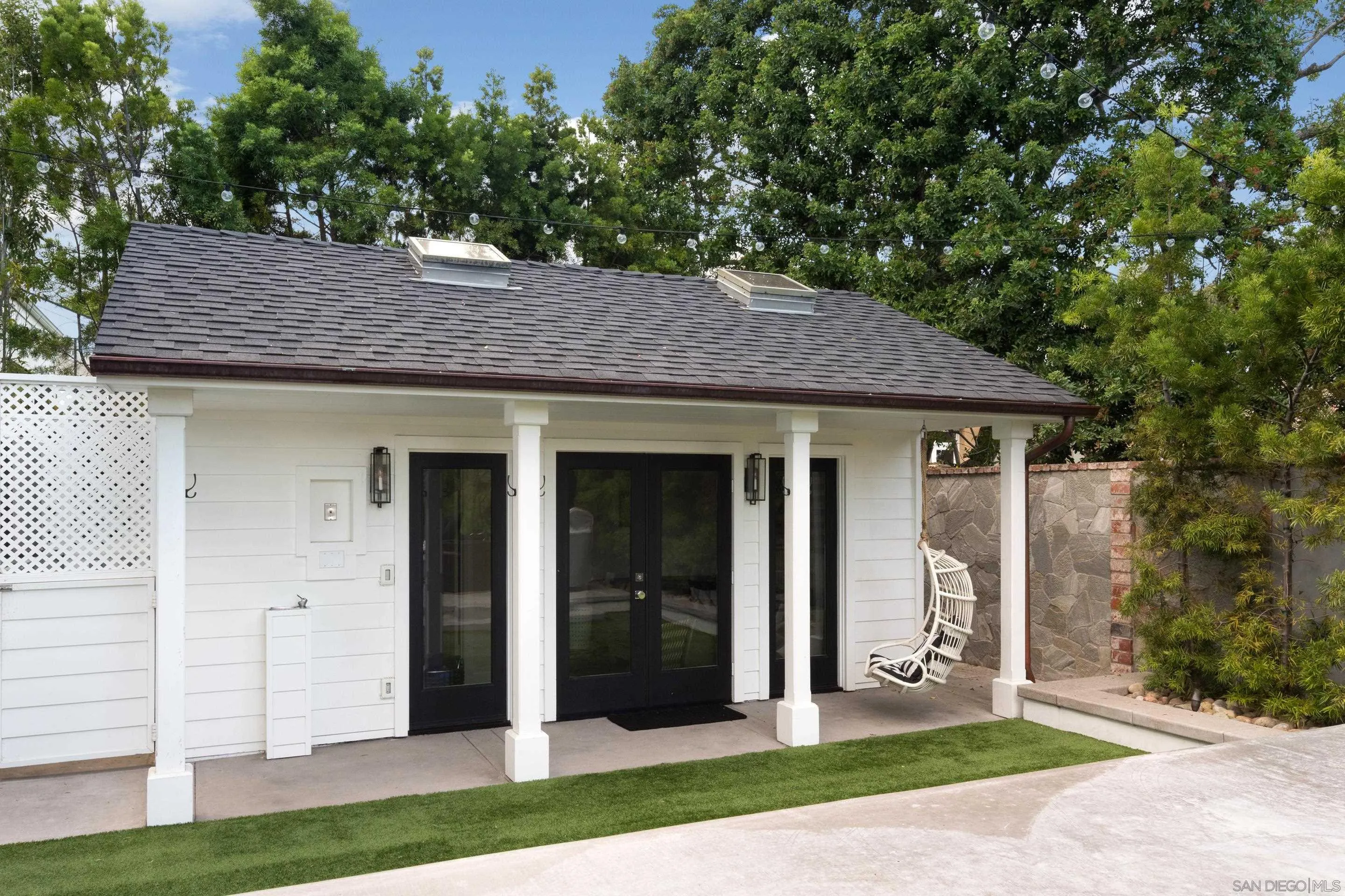 3530 Silvergate Place San Diego, CA 92106 - Photo 36 of 41 a front view of a house with a garden and yard