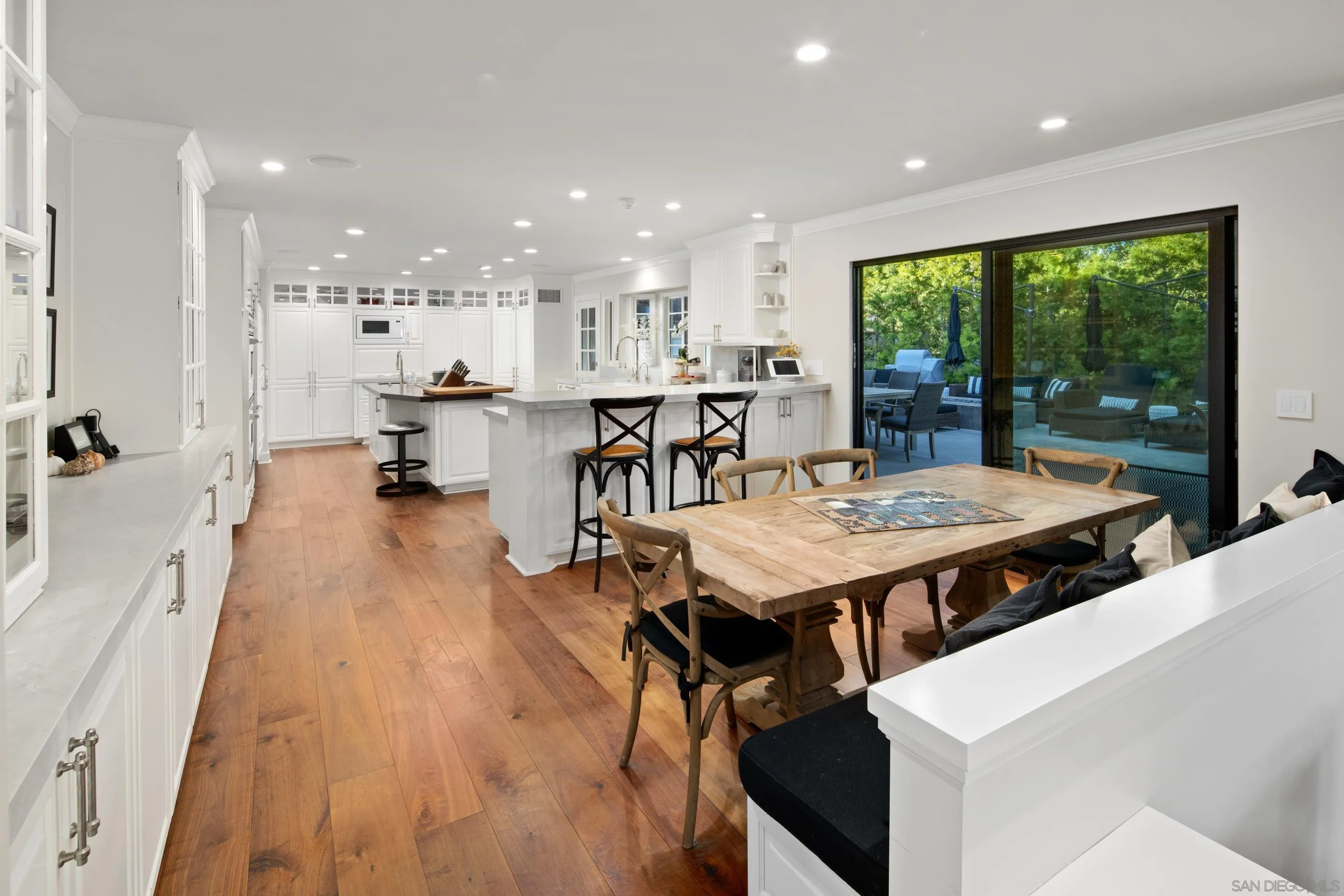 3530 Silvergate Place San Diego, CA 92106 - Photo 7 of 41 a view of a dining room with furniture and wooden floor