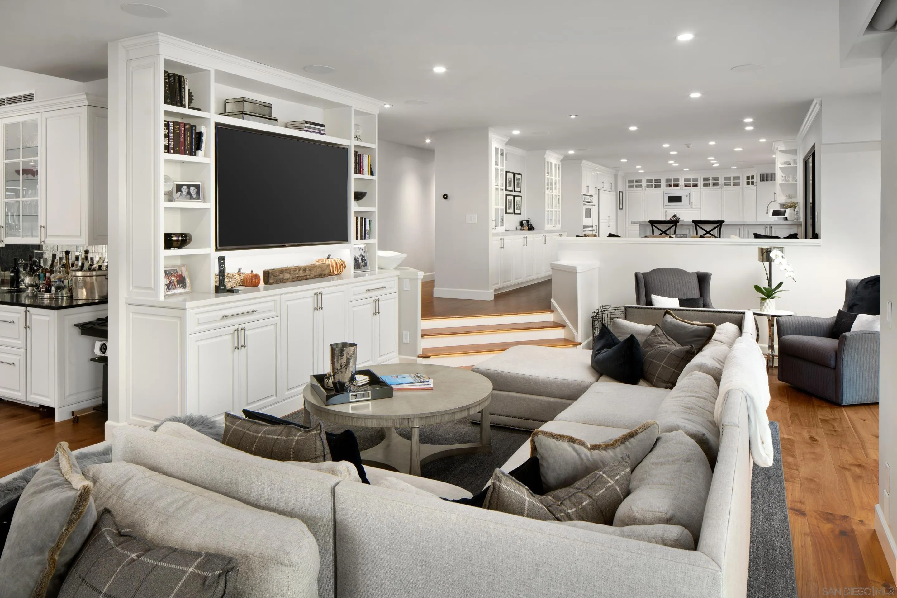 3530 Silvergate Place San Diego, CA 92106 - Photo 8 of 41 a living room with furniture kitchen view and a flat screen tv