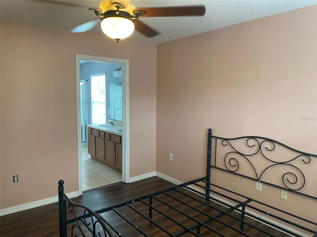 a view of a bathroom from a hallway