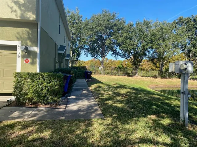 a view of a yard with plants