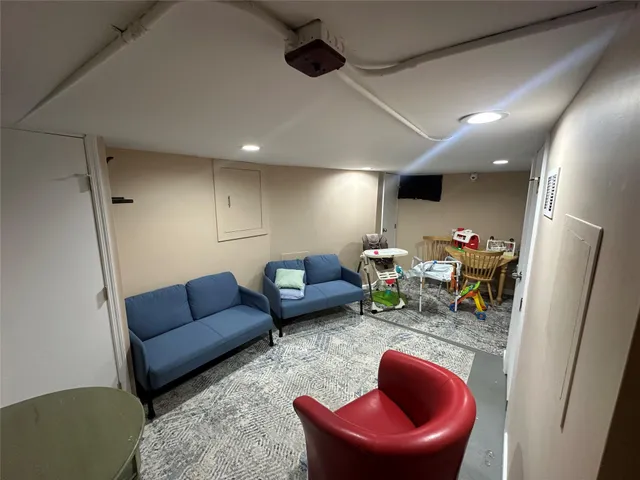 a living room with furniture and a couch
