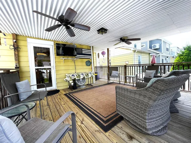 a view of a chairs and tables in the balcony