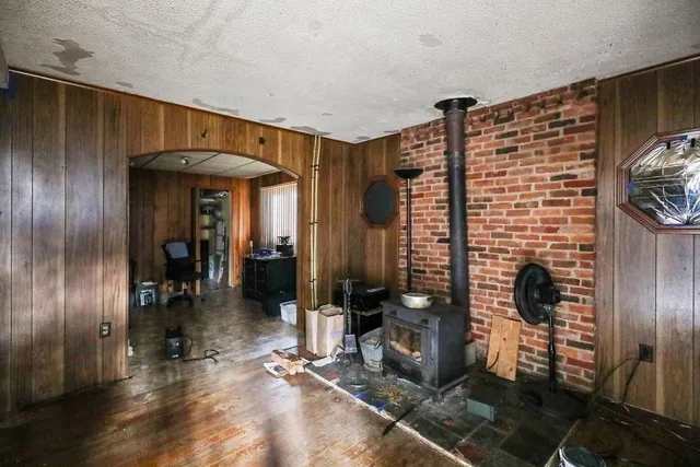 a view of gallery with wooden floor