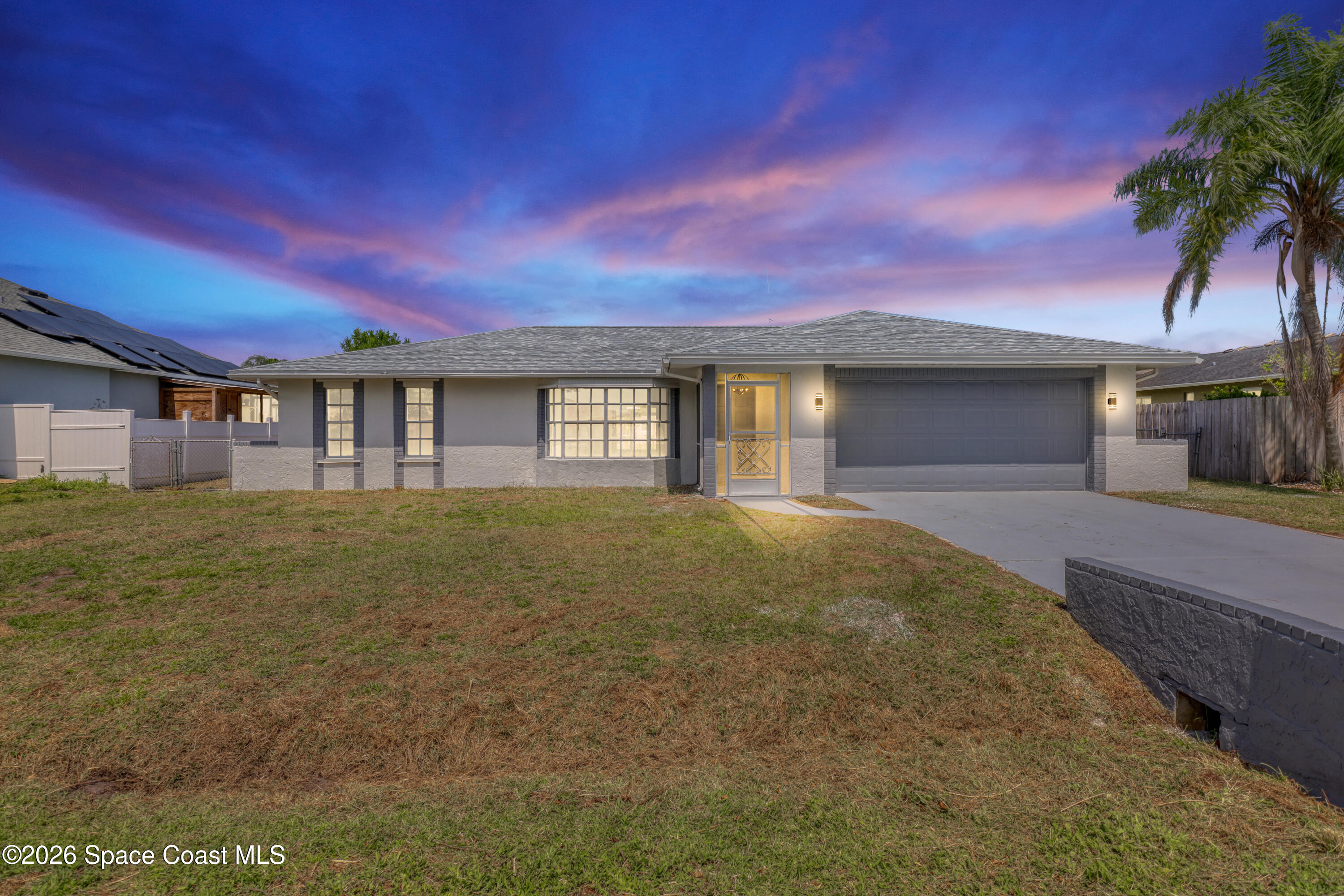 999 Castile Road Southeast Palm Bay, FL 32909 - Photo 2 of 45 Imposed Twighlight Front
