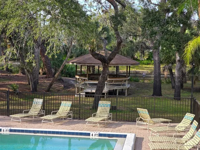 a view of a lake with a patio