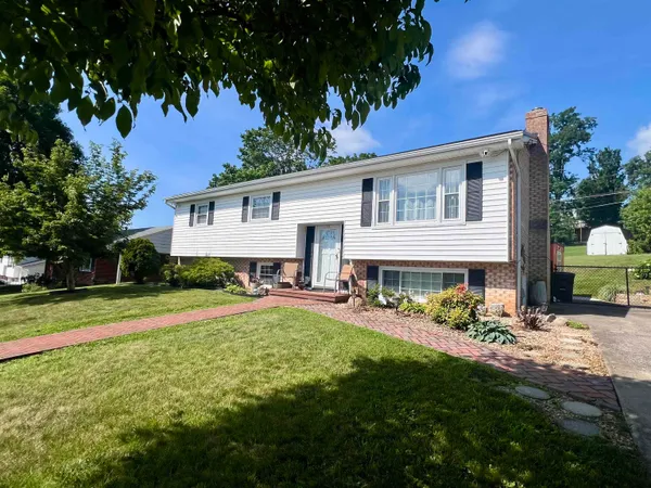 a view of a house with a swimming pool