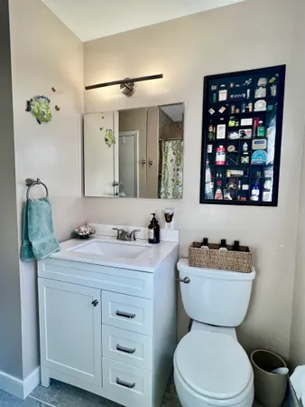 a bathroom with a shower and a shower
