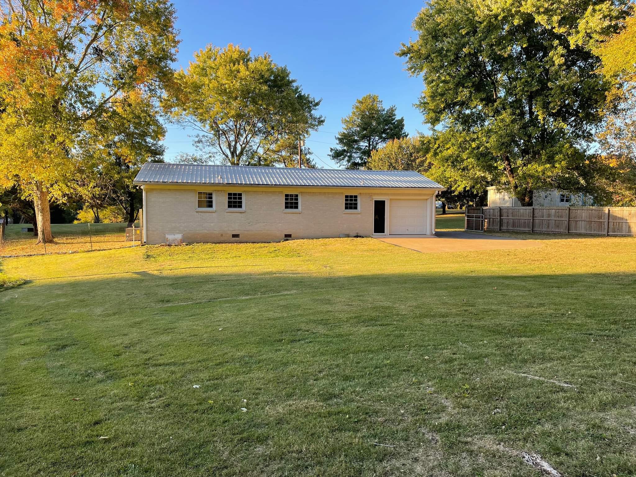 5755 Tackets Branch Road Minor Hill, TN 38473 - Photo 2 of 13 a view of a house with a big yard