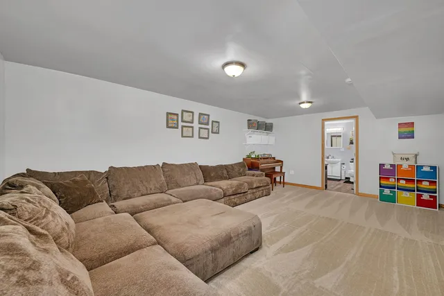 a living room with furniture and a couch