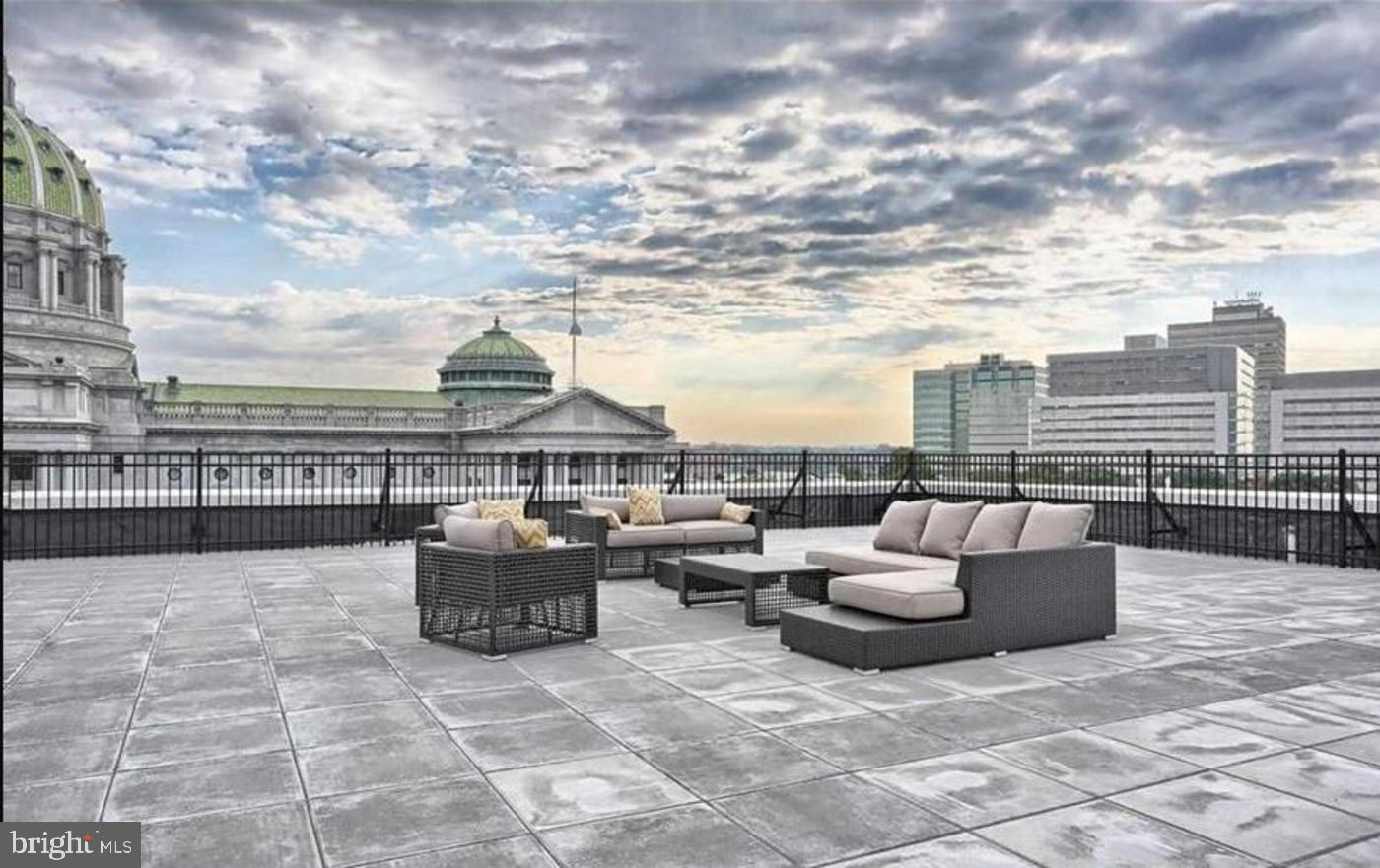 231 State Street, Unit 802 Harrisburg, PA 17101 - Photo 12 of 27 a view of roof deck with couches and city view