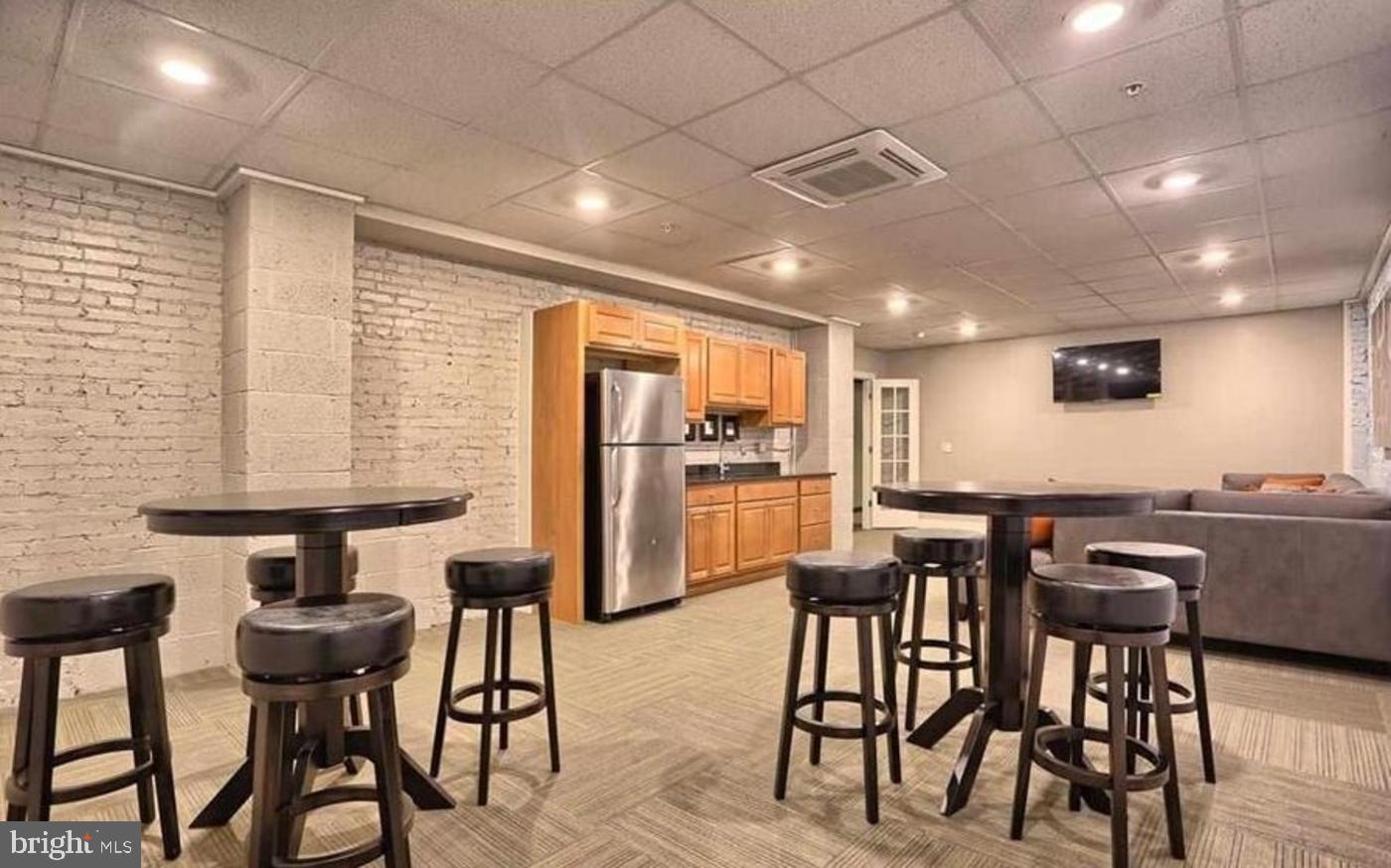 231 State Street, Unit 802 Harrisburg, PA 17101 - Photo 26 of 27 a view of a dining room with furniture