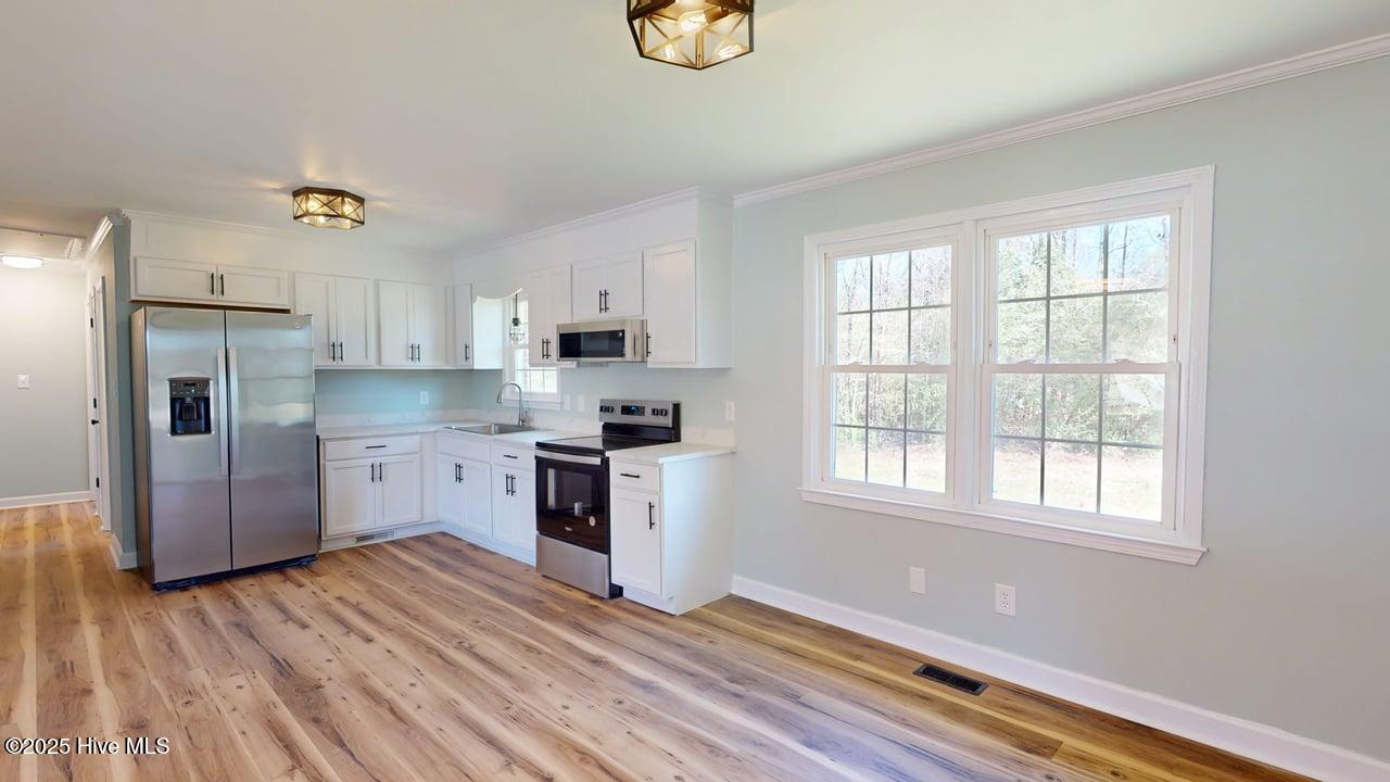 677 Rhodestown Road Jacksonville, NC 28540 - Photo 7 of 26 677-Rhodestown-04032025_173218