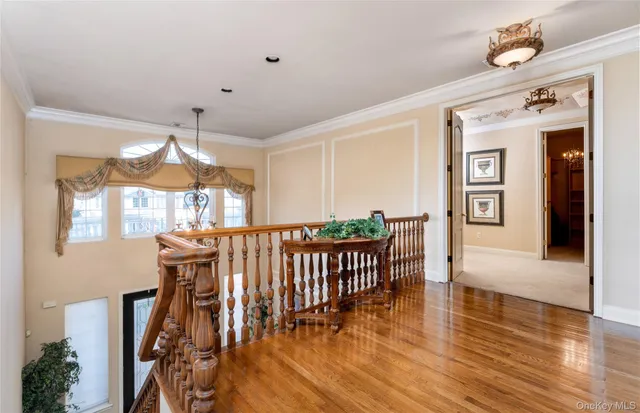 a bedroom with bed and window